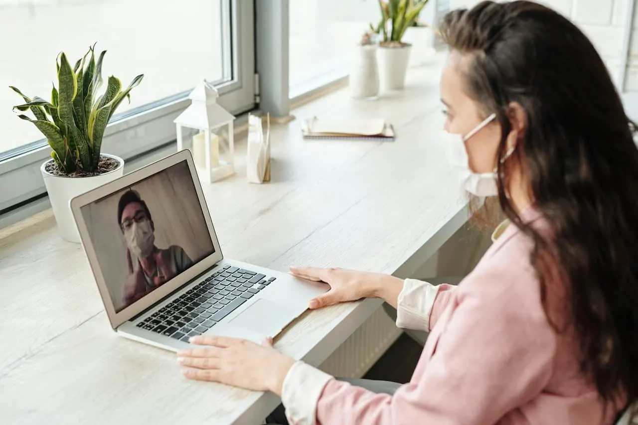 woman-having-video-call-with-doctor